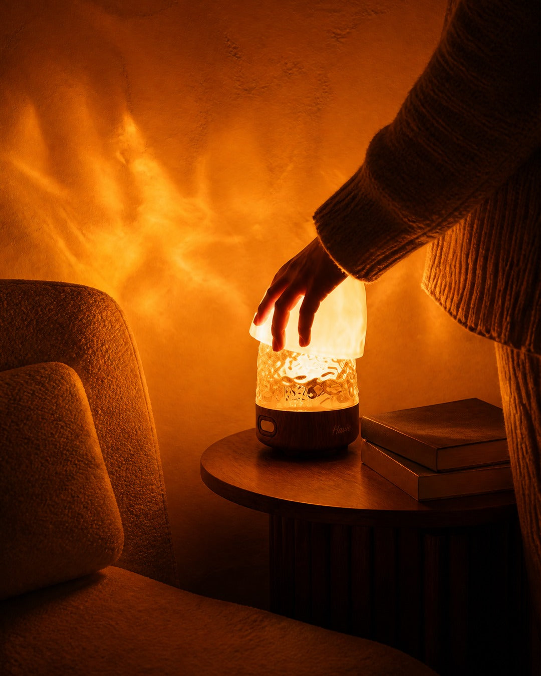 Havie lamp glowing in a cozy bedroom