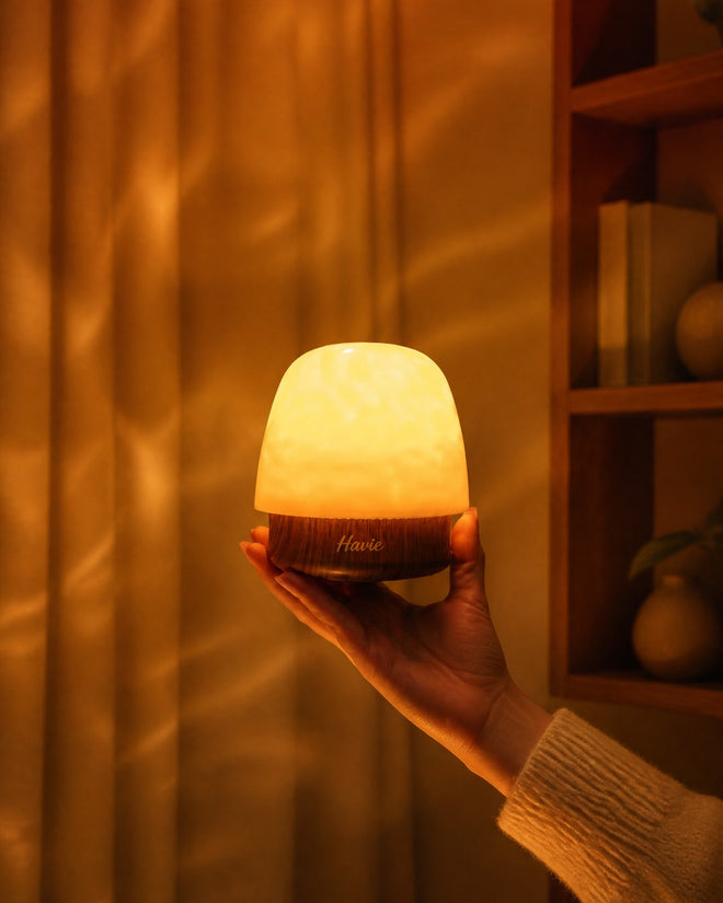 Havie lamp glowing in a cozy bedroom