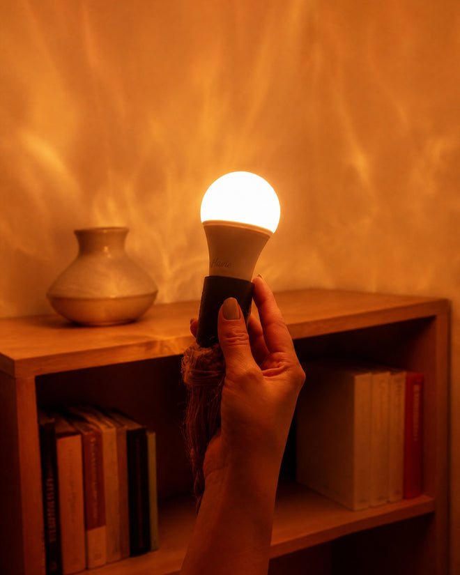 Havie lamp glowing in a cozy bedroom