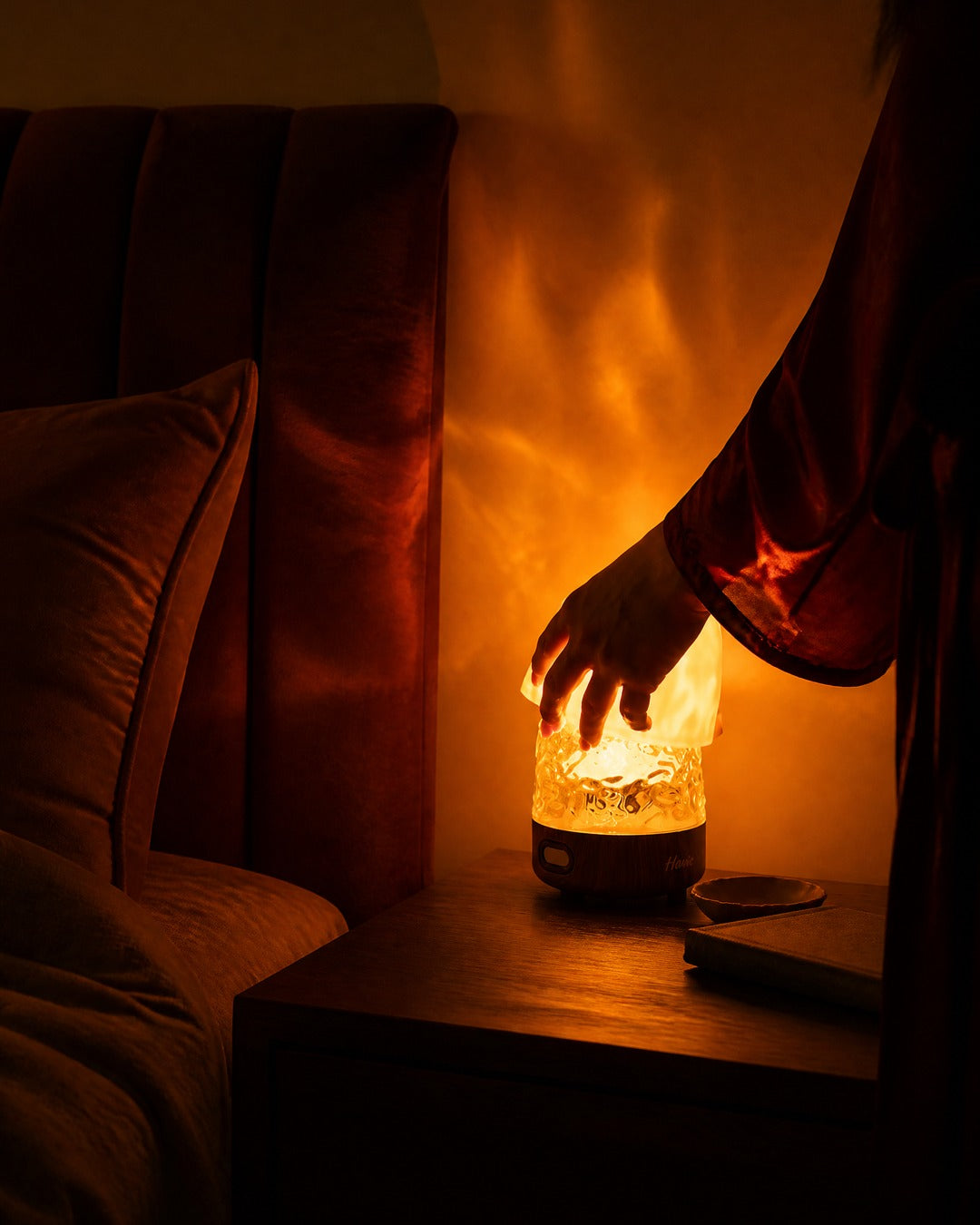 Havie lamp glowing in a cozy bedroom